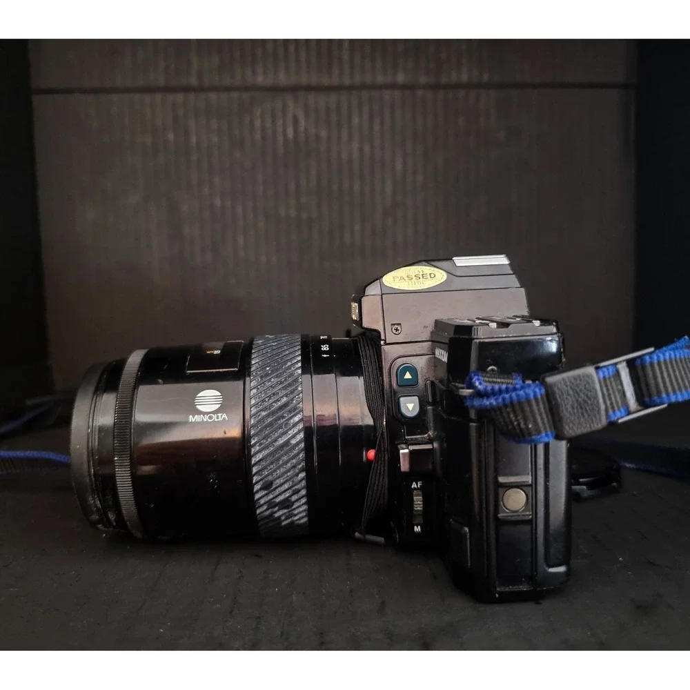 Minolta Maxxum 7000 35mm SLR Film Camera with 28-300, 70-210, and 28-85 Lenses